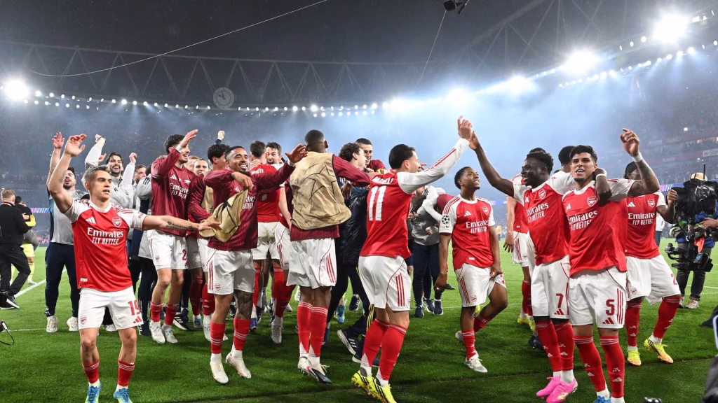The Arsenal team celebrate at the emirates