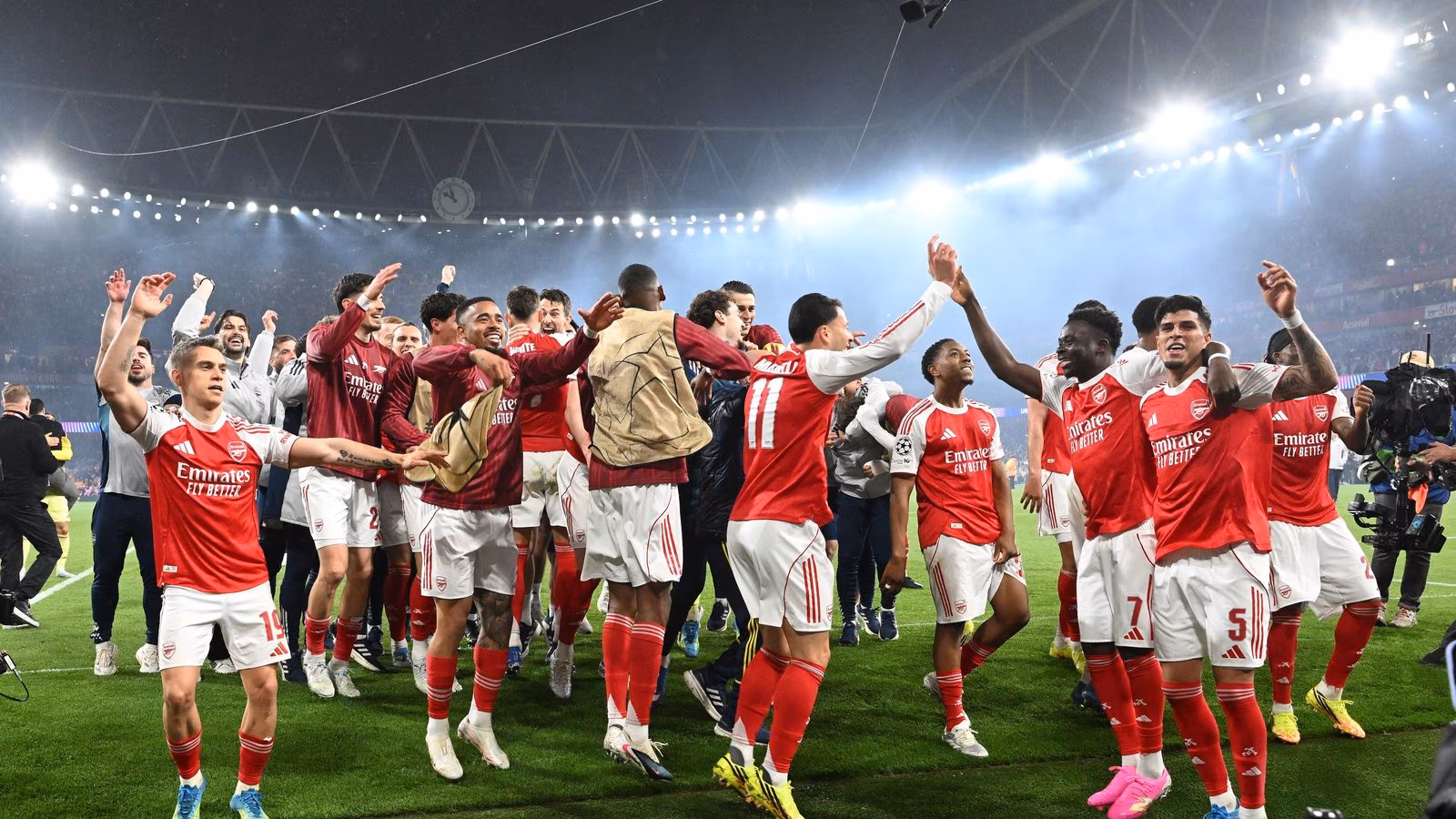The Arsenal team celebrate at the emirates